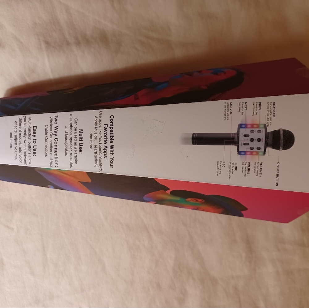 Karaoke Microphone with speaker. USB charging, Bluetooth. With flashing lights.
